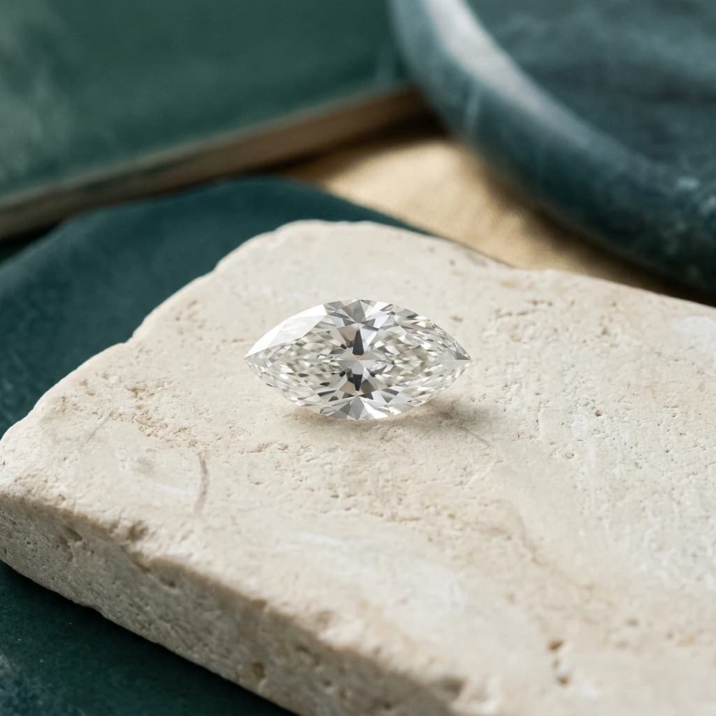 Boat-shaped marquise cut diamond with two pointed ends and brilliant faceting