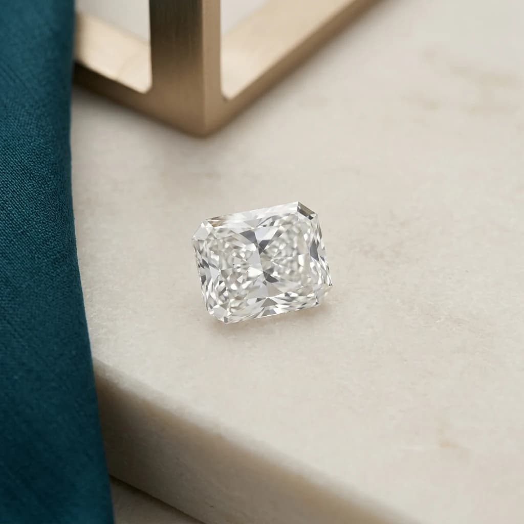 Rectangular radiant cut diamond with cropped corners and brilliant faceting